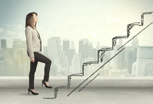 stock-photo-business-woman-climbing-up-on-hand-drawn-staircase-concept.webp